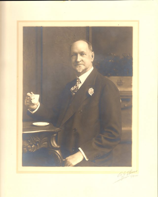 Joel-Cheek-with-cup-and-saucer-portrait-