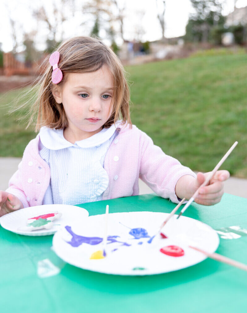 Young girl painting in outdoors at Cheekwood