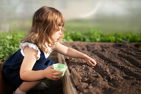 Adorable-Little-Girl-Planting